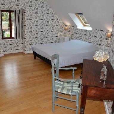 Lit de la chambre d'hôtes 