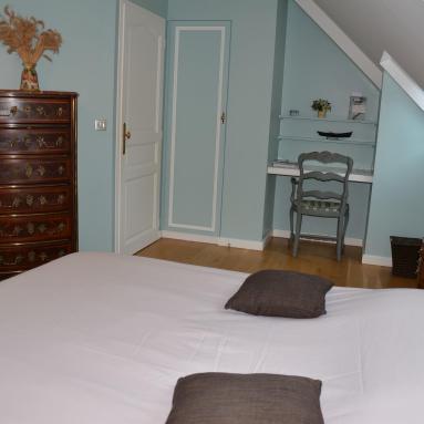 Lit de la chambre d'hôtes 